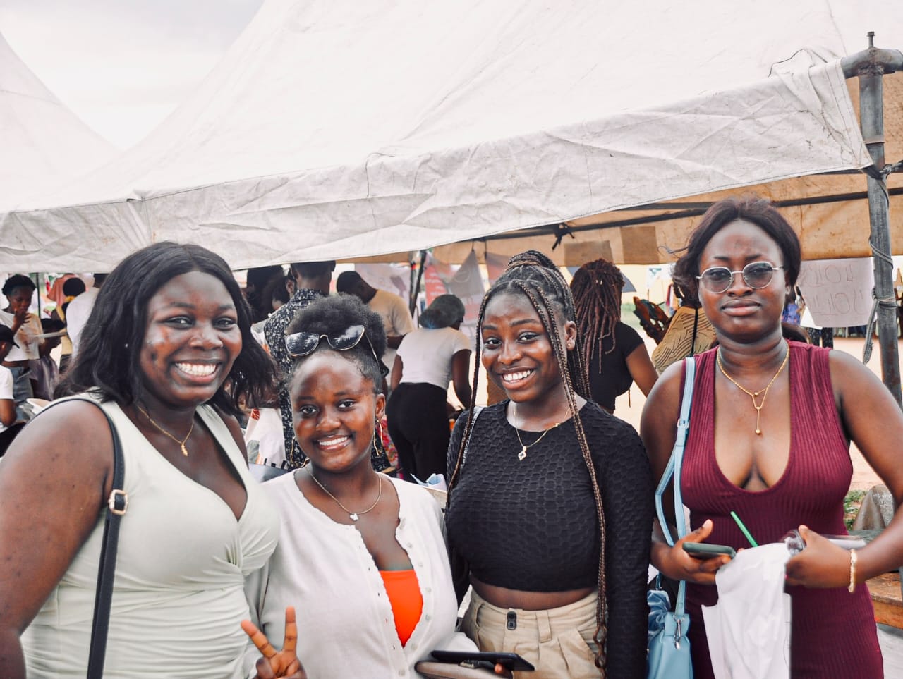 Friends smiling together at MedFest